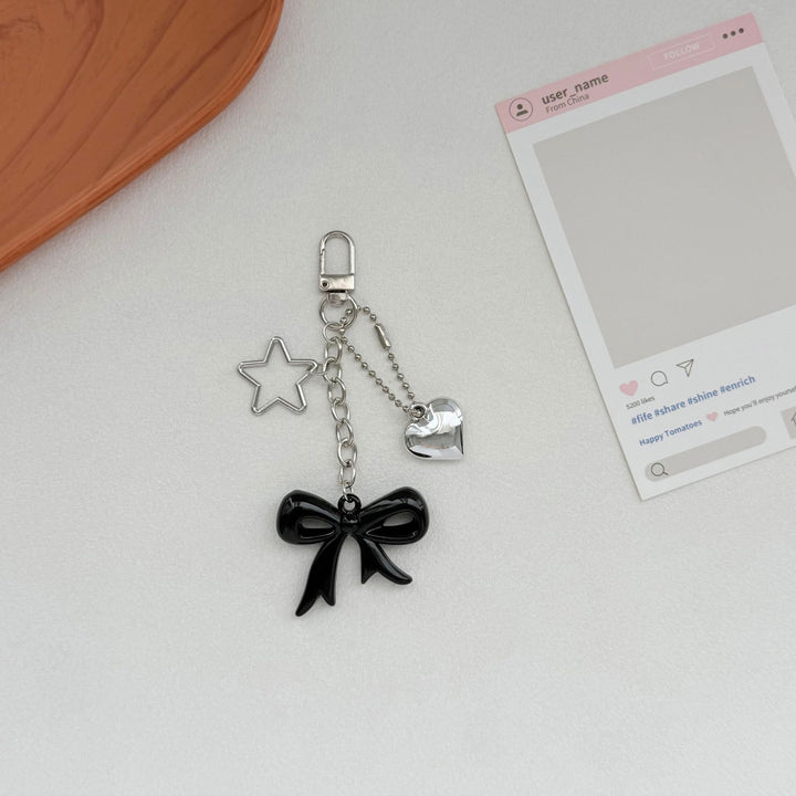 Playful Bow and Star Keychain Bowlift