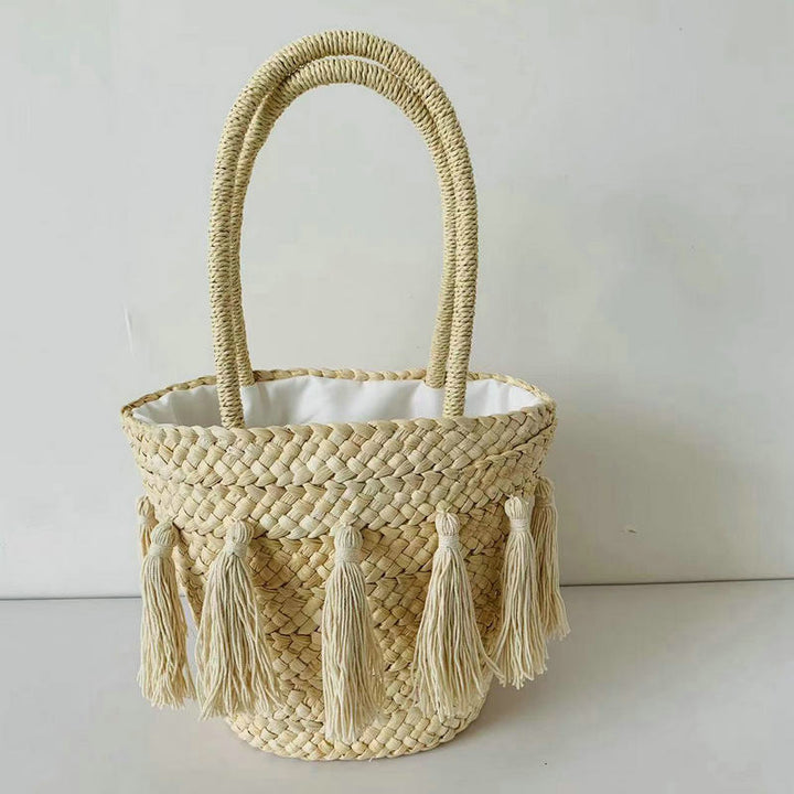 Trendy basket bag with tassels Bowlift