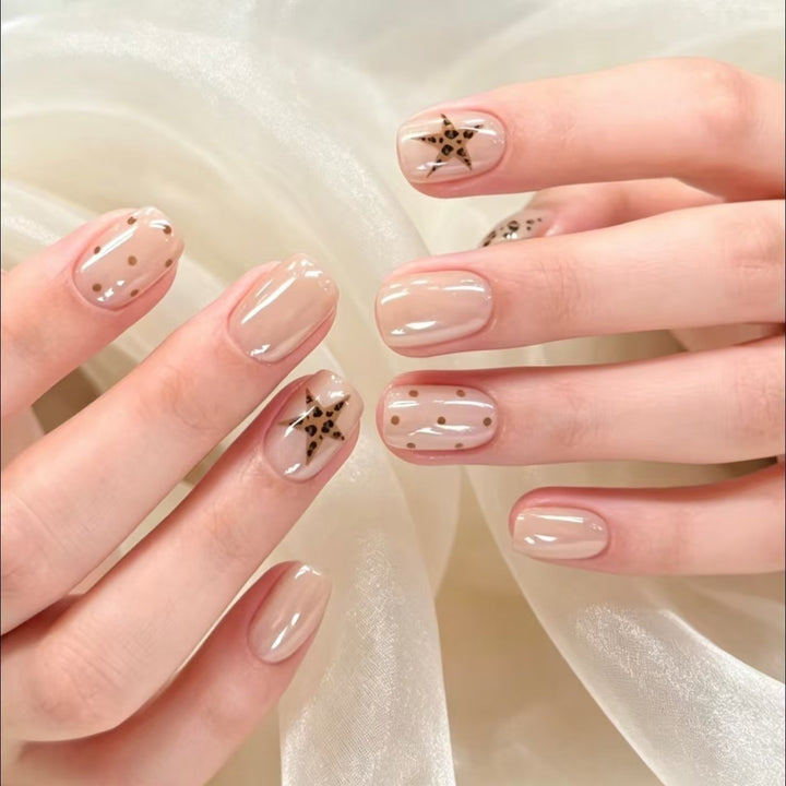 Artistic Nail Art Extensions with Star Accents