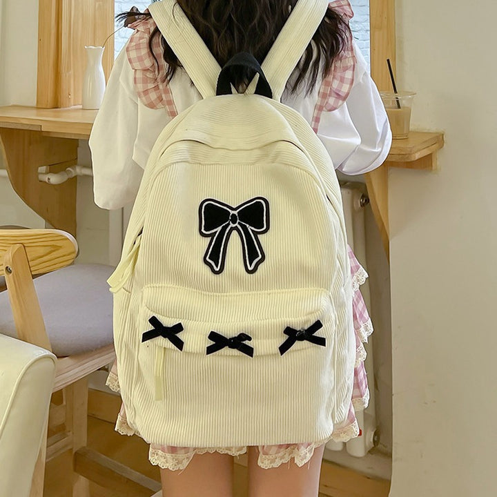 Backpack with Playful Ribbon Design Bowlift