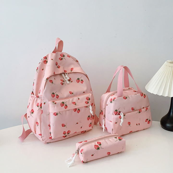 Backpack set with cheerful strawberry pattern and practical compartments Bowlift