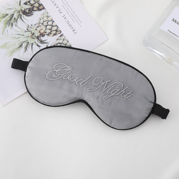 Unisex embroidered contoured sleep mask with decorative text embroidery and adjustable elastic band Bowlift