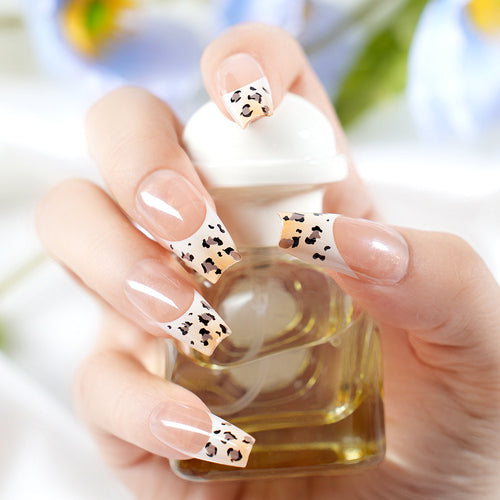 Stylish French Tip Press-On Nails with Animal Print Bowlift