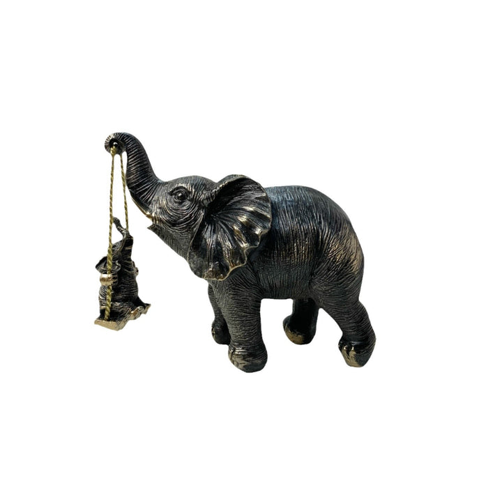 Decorative elephant figure with child Bowlift