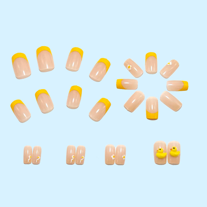 Artificial nails with playful duck motif and spring accents Bowlift