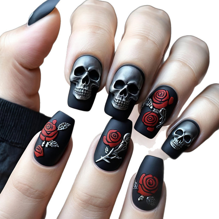Creative nail art with skull and rose designs Bowlift
