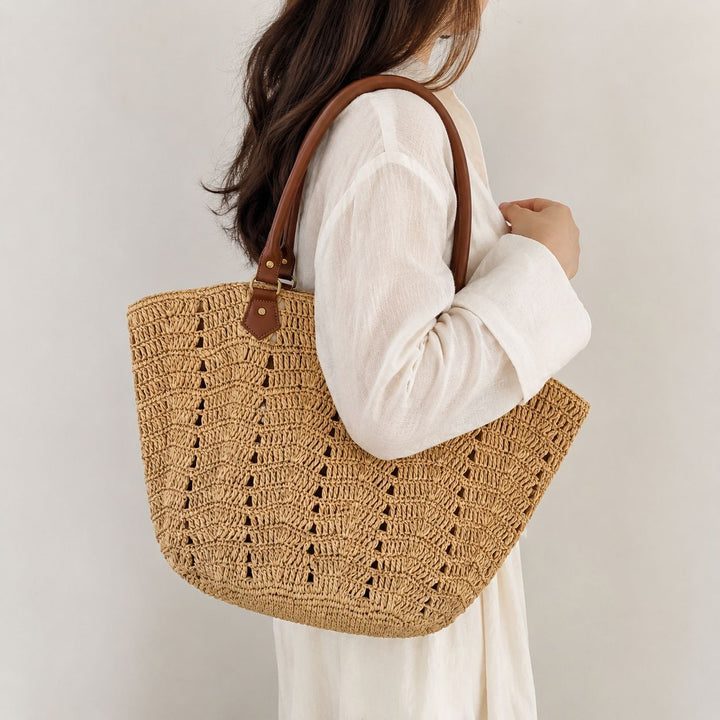 Beach chair bag with braided design and comfortable leather handles Bowlift