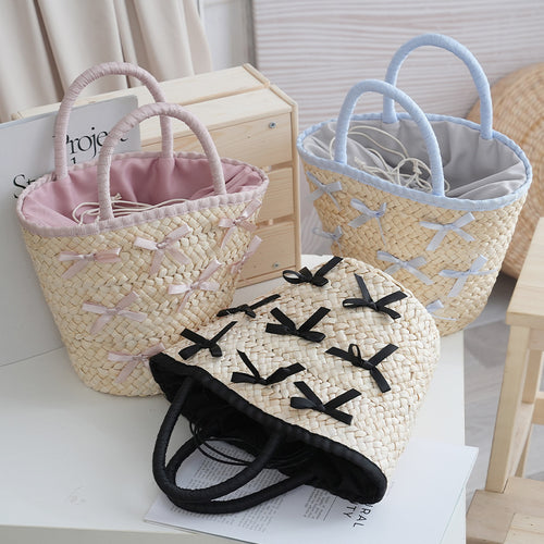 Basket bag with delicate bows and padded edge Bowlift