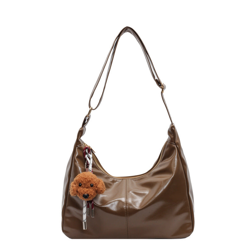 Shoulder bag with charming animal pendant Bowlift