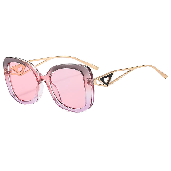 Ladies fashionable oversized sunglasses with luxurious heart detail Bowlift