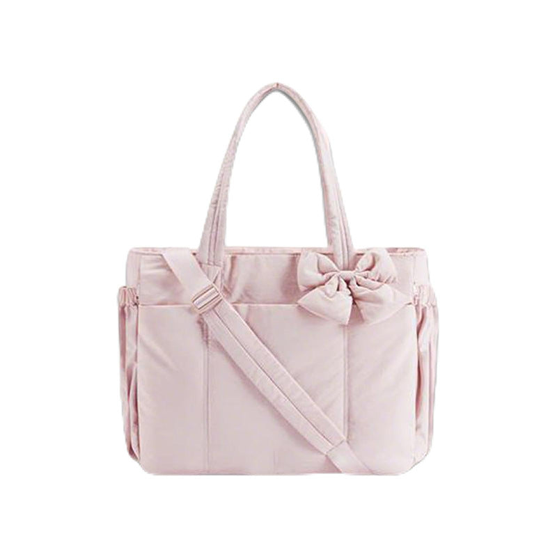 Practical tote bag with retractable shoulder strap and fashionable bow Bowlift