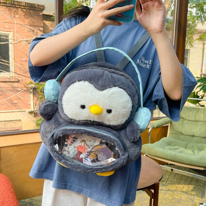 Plush backpack with transparent viewing window Bowlift