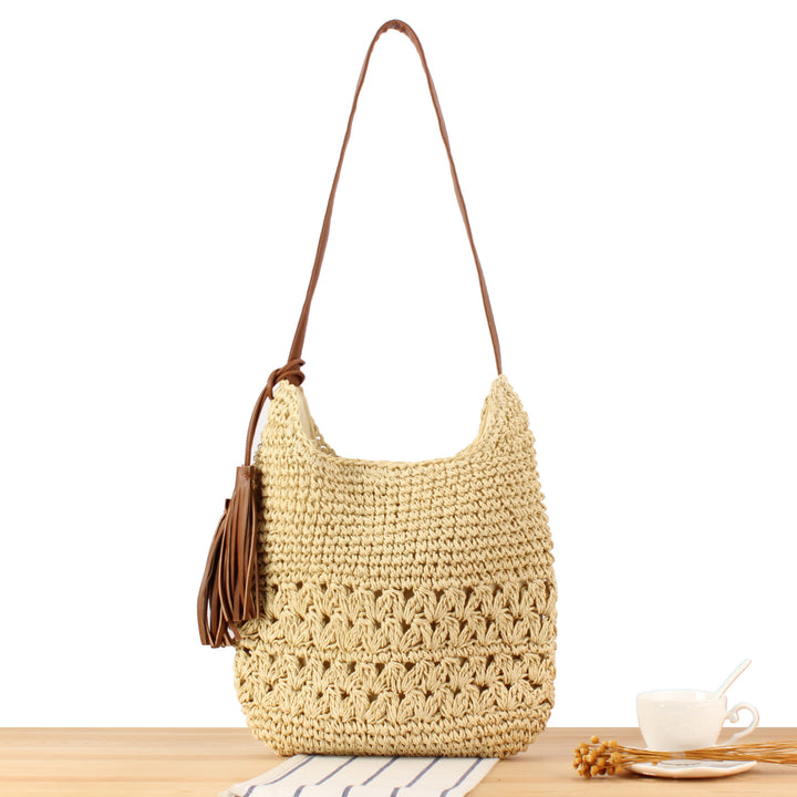 Shoulder bag made of hand-knotted natural material with fringed shoulder strap Bowlift