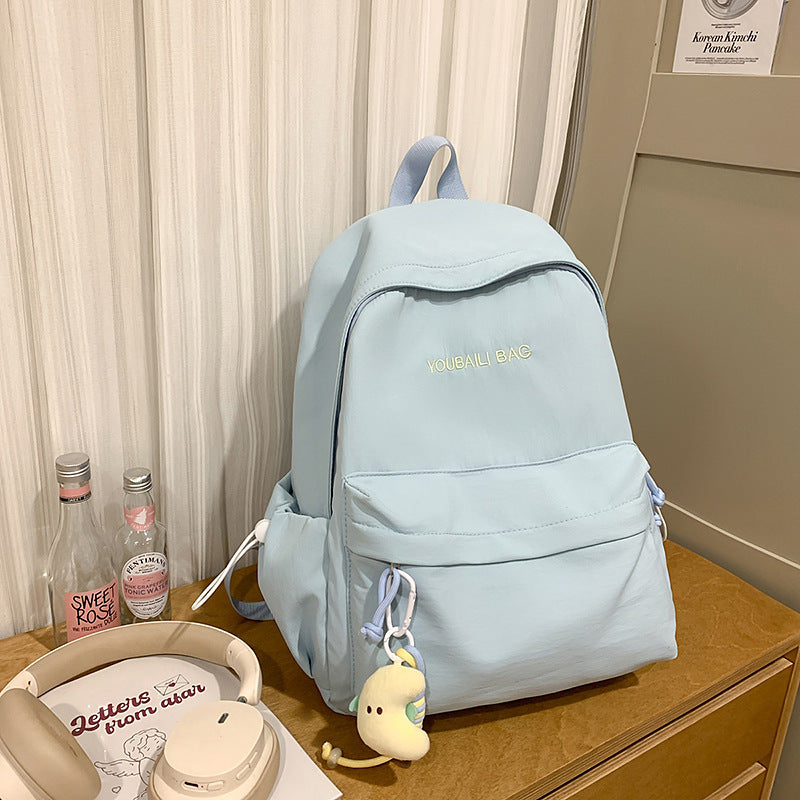 Lightweight Casual Backpack with Decorative Keychain Bowlift