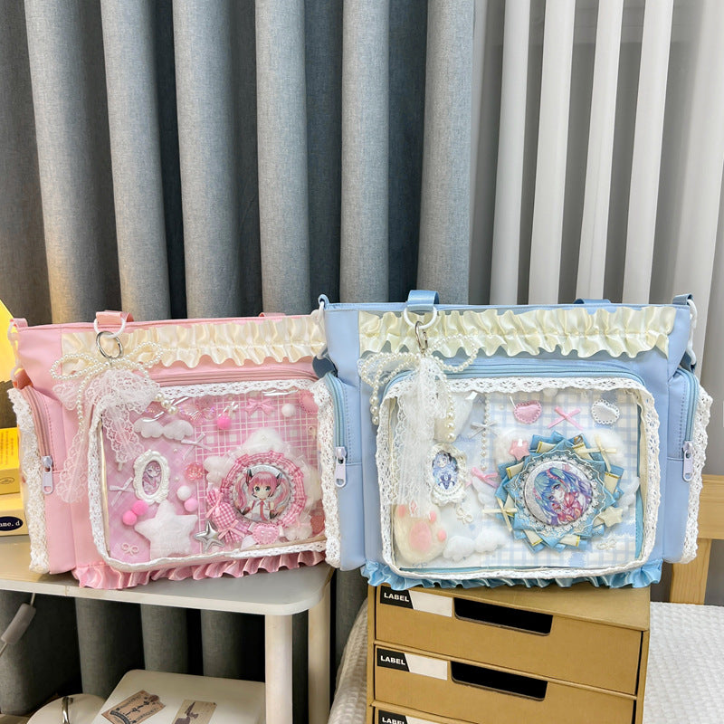 Shoulder bag with transparent front and playful applications Bowlift