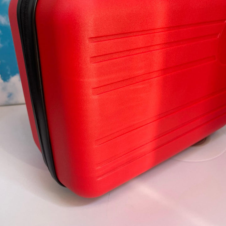 compact hardshell travel carry case with top handle and reinforced ridged shell Bowlift