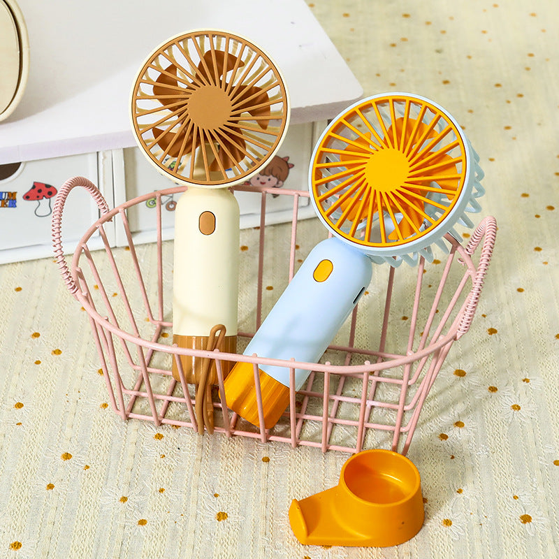 Portable hand fan with ergonomic grip and USB charging function Bowlift