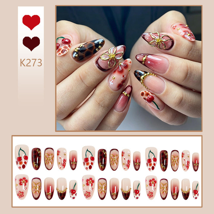 Artificial nail set with elegant floral designs and glitter effect Bowlift