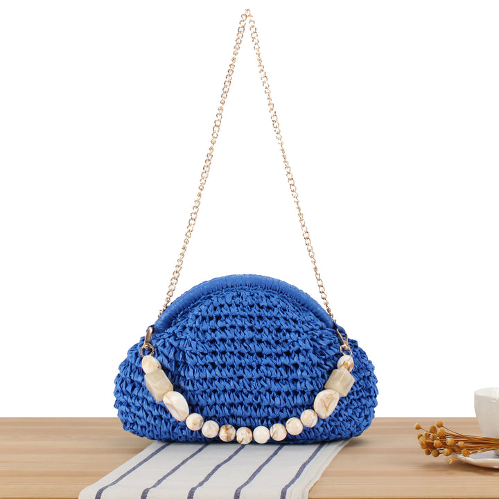 Shoulder bag with decorative shell design Bowlift