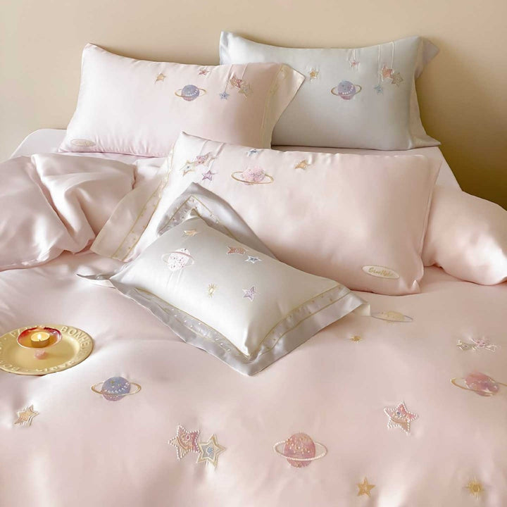 Satin bedding set with embroidered galaxy motif and silky smooth finish