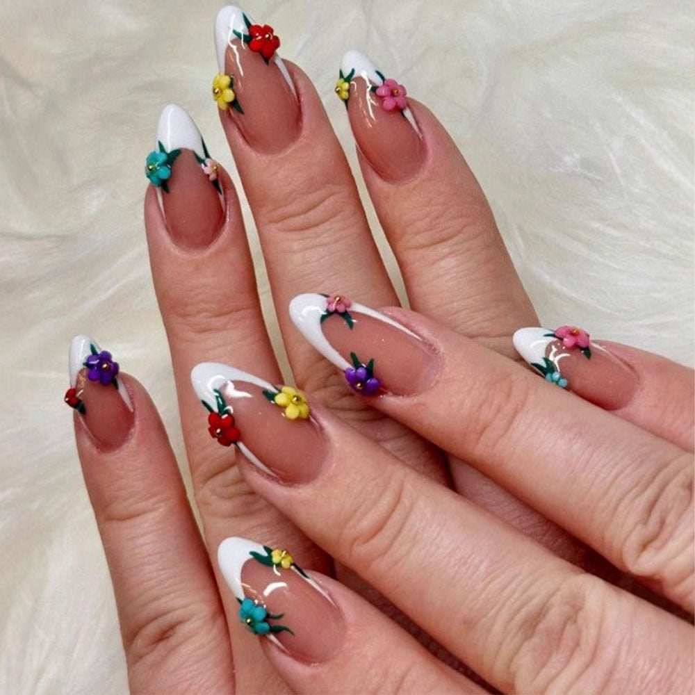 Artificial nails in a playful flower design with glittering accents Bowlift