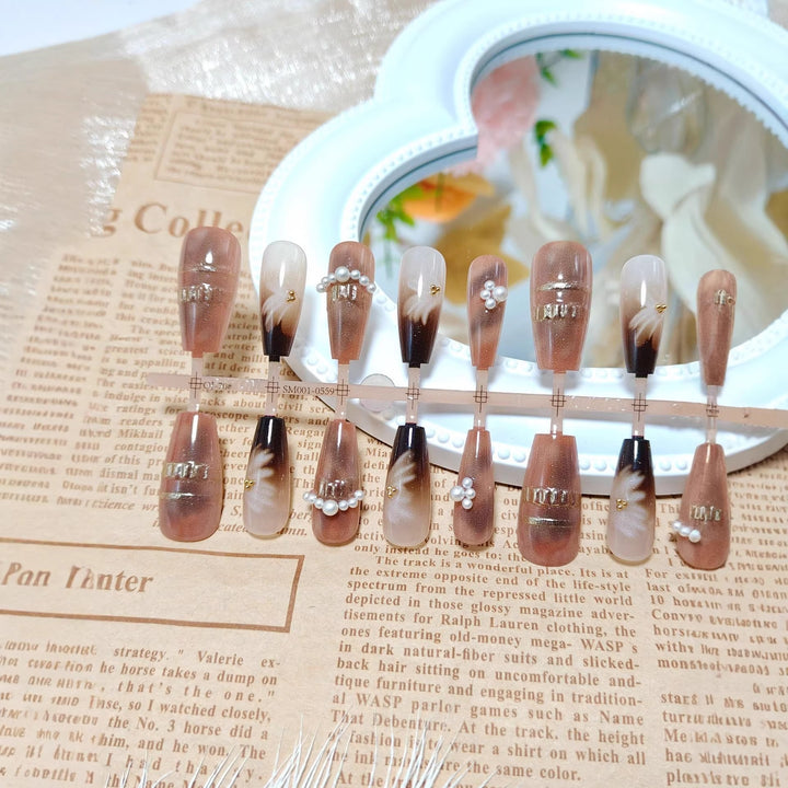 Artificial nail set with elegant ombre and pearl design Bowlift
