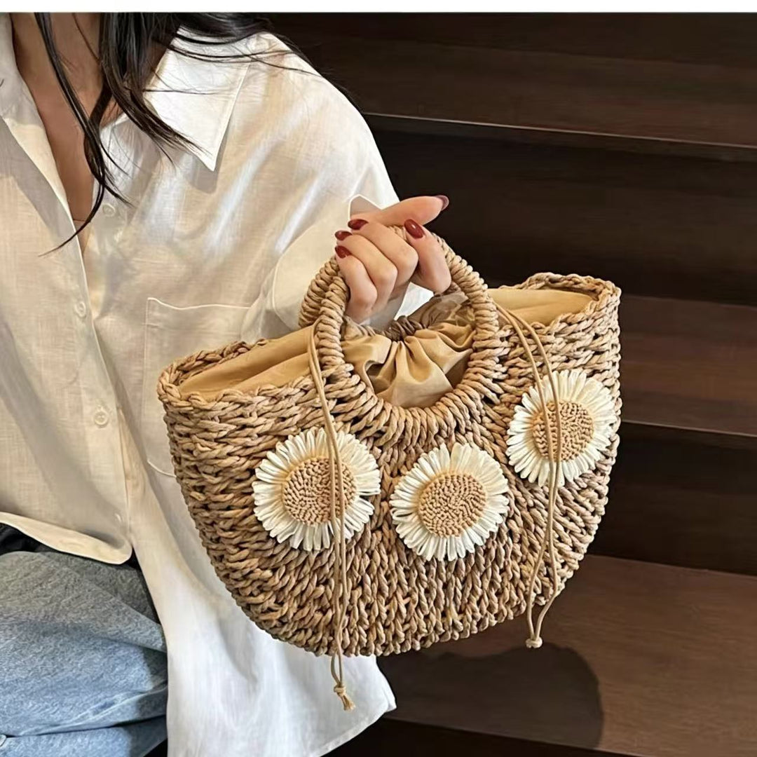 Padded basket bag with floral embellishments Bowlift