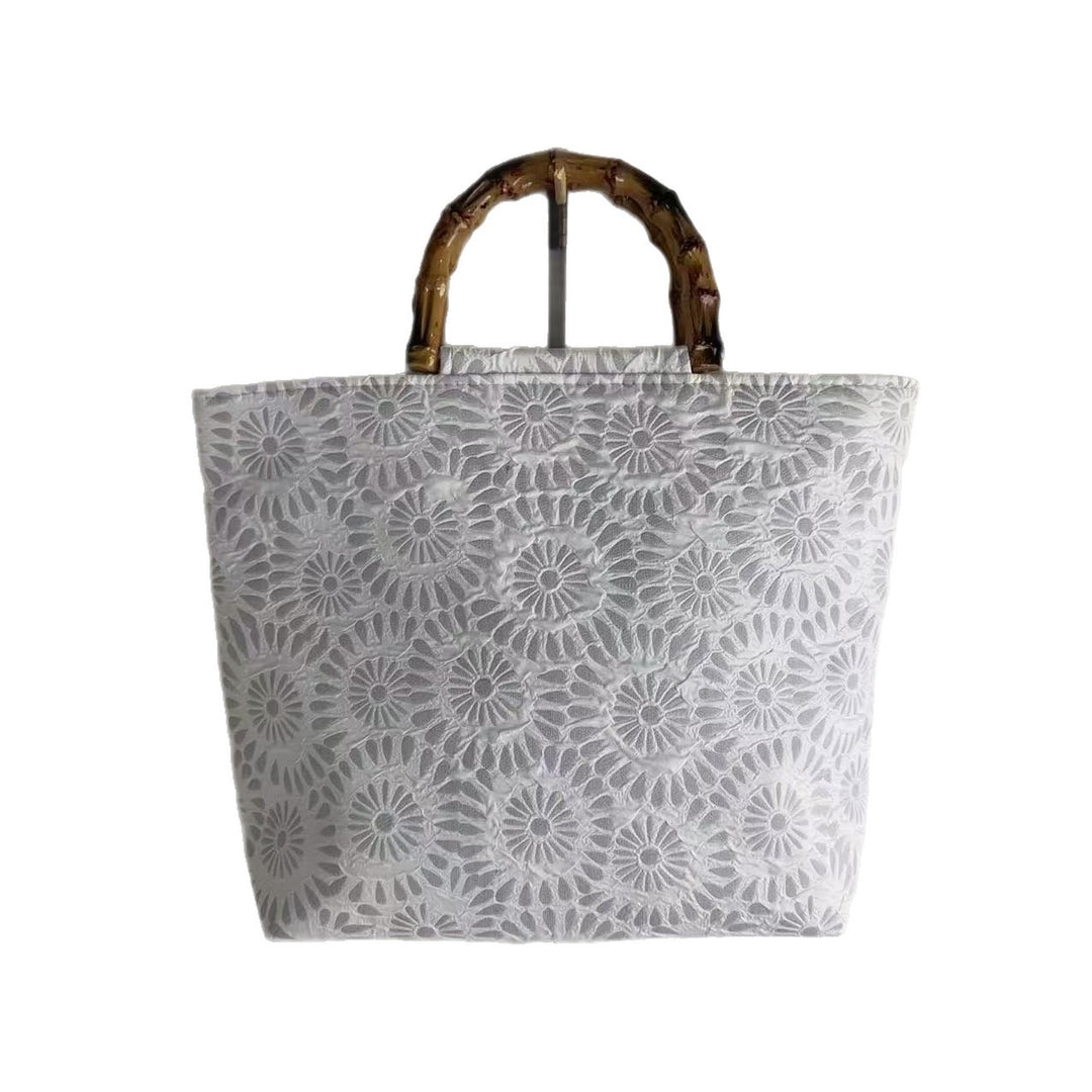 Exclusive and handcrafted beach bag with bamboo handles Bowlift
