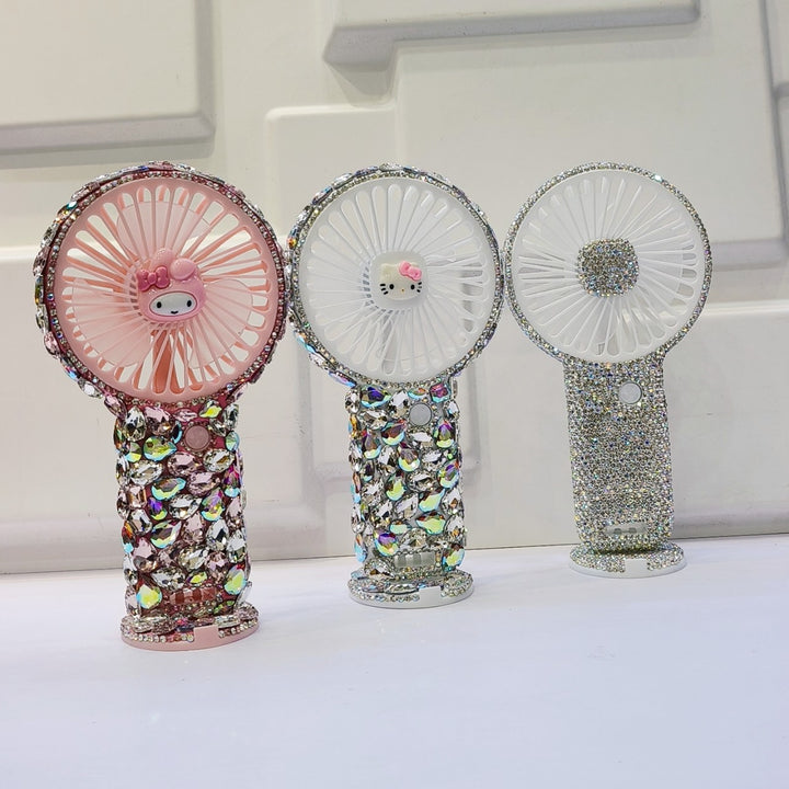 Women's portable hand fan rechargeable with rhinestone accents and cat emblem Bowlift