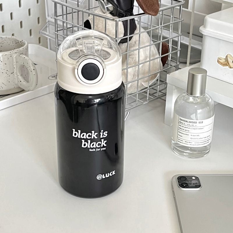 Women's insulated drinking bottle with innovative flip lid and practical handle Bowlift