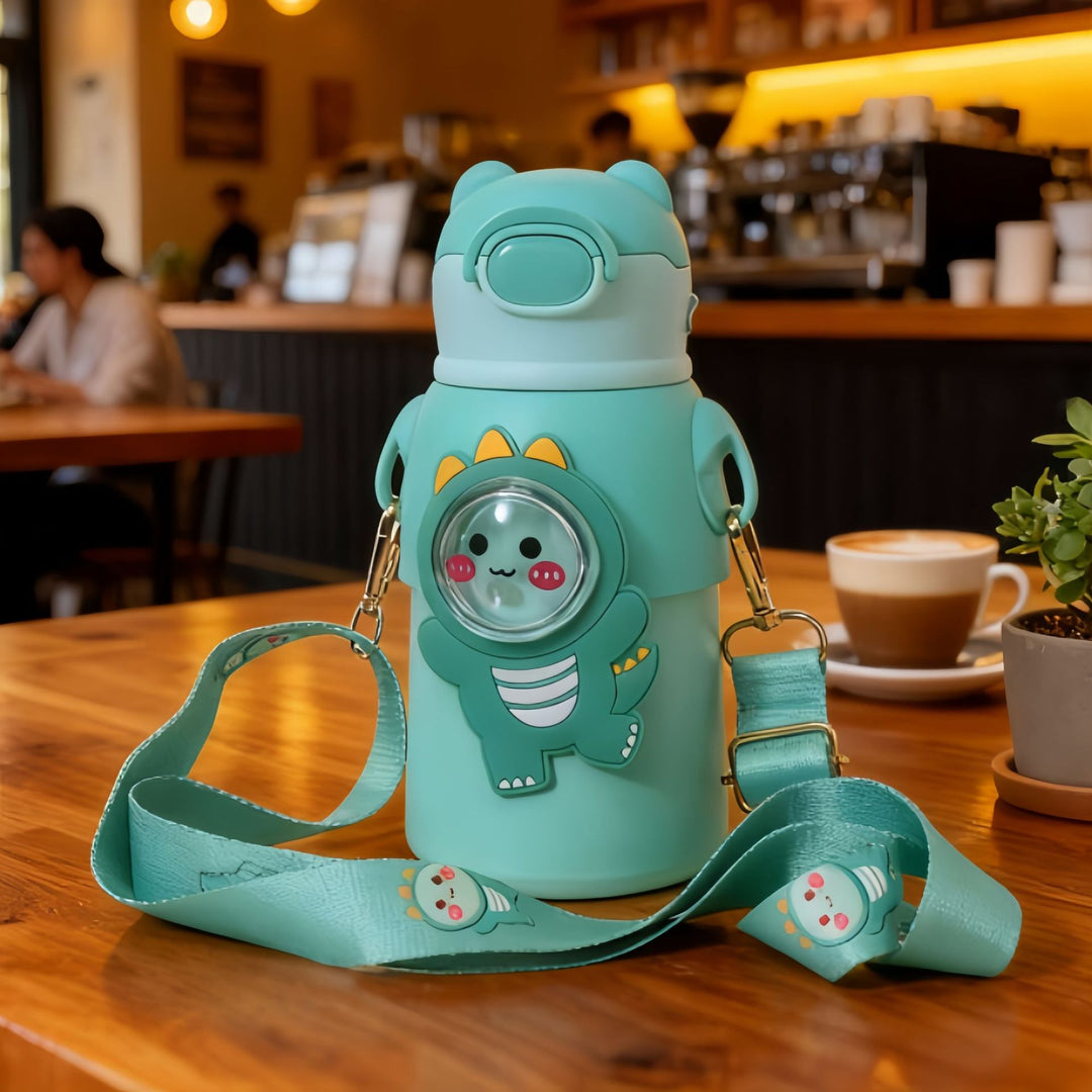 Insulated drinking bottle with integrated carrying strap Bowlift