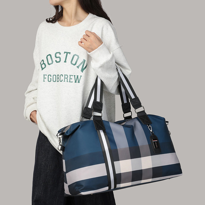 Sporty travel bag with intelligent compartment design Bowlift