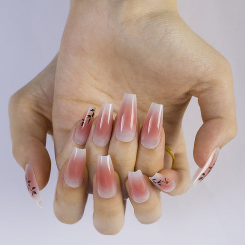 Press-on nails in elegant ombre design with floral accents Bowlift