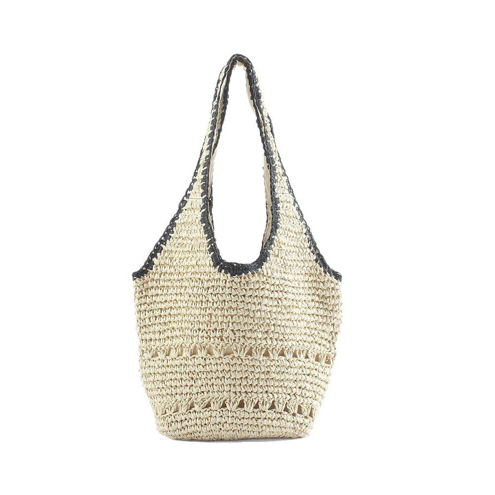 Beach shoulder bag made of hand-woven raffia with elegant lace trims Bowlift