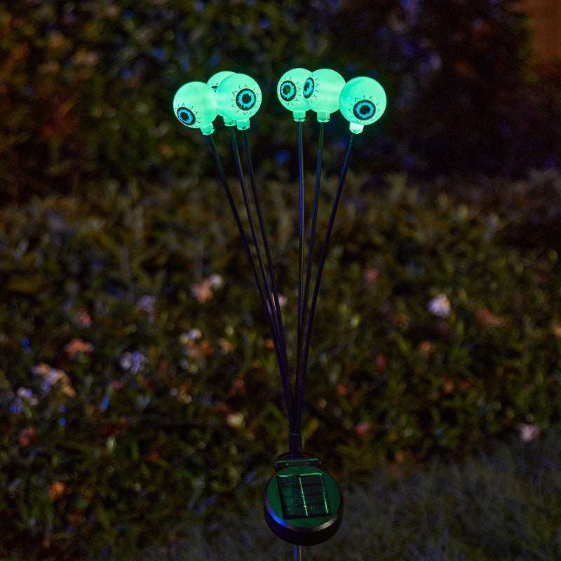 Creepy garden lights with eye motif Bowlift