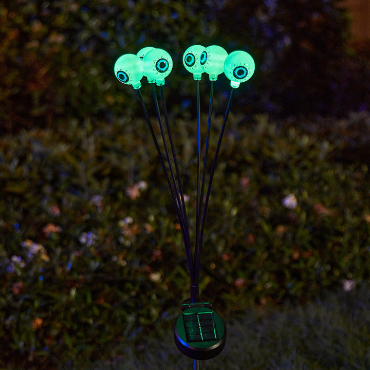 Creepy garden lights with eye motif Bowlift