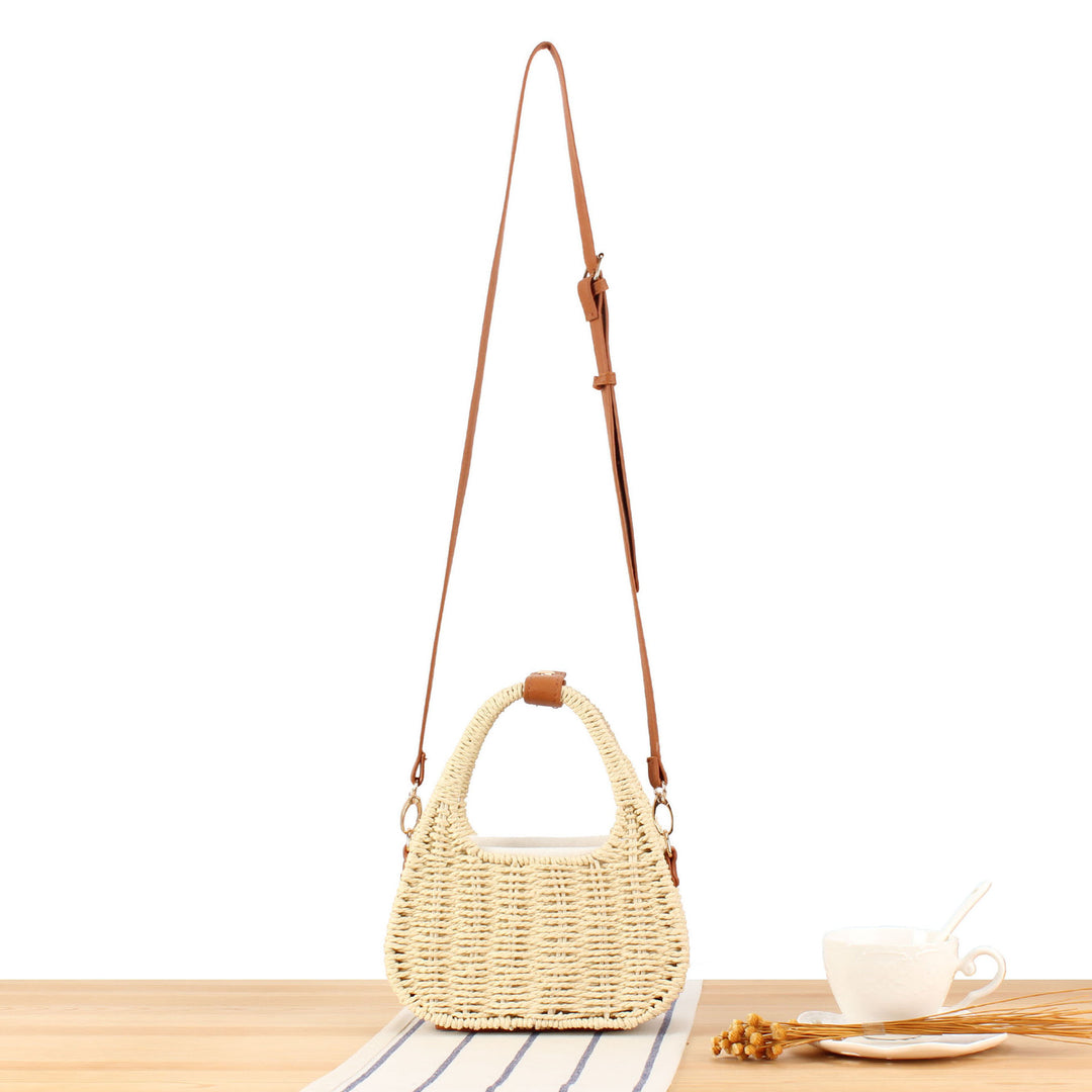 Shoulder bag made of woven natural material with elegant leather accent Bowlift
