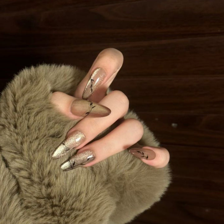 Artistic Long Stiletto Press-On Nails with Floral and Gemstone Accents Bowlift