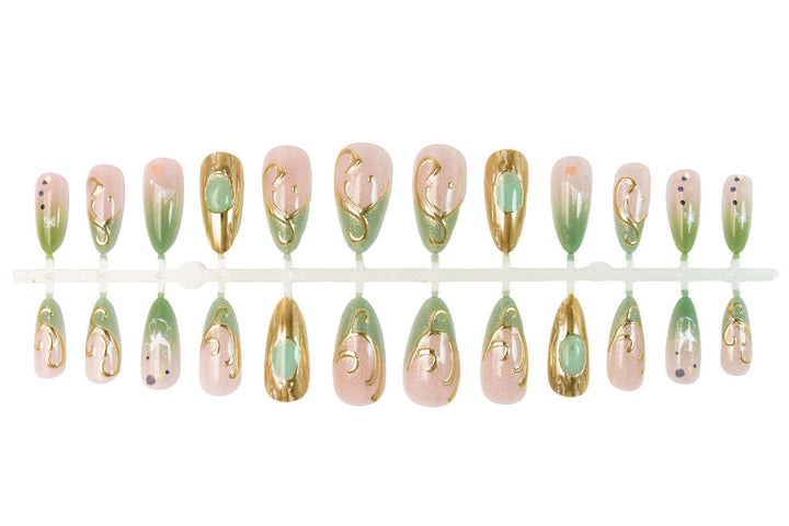 Nail art set with elegant gold accents and floral designs Bowlift