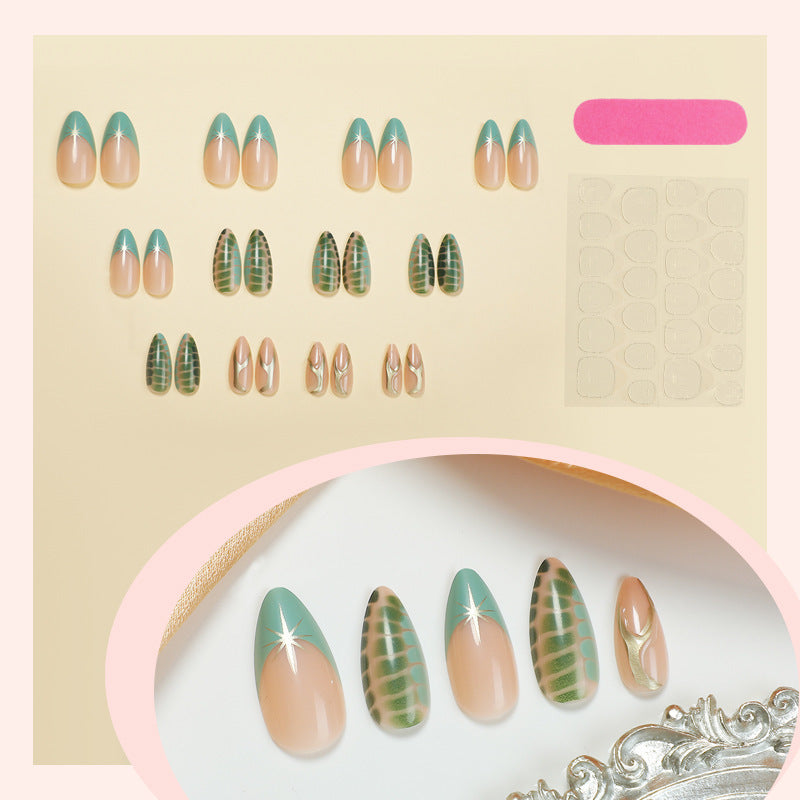 Artistic Press-On Nail Art Set with Decorative Metallic Accents Bowlift