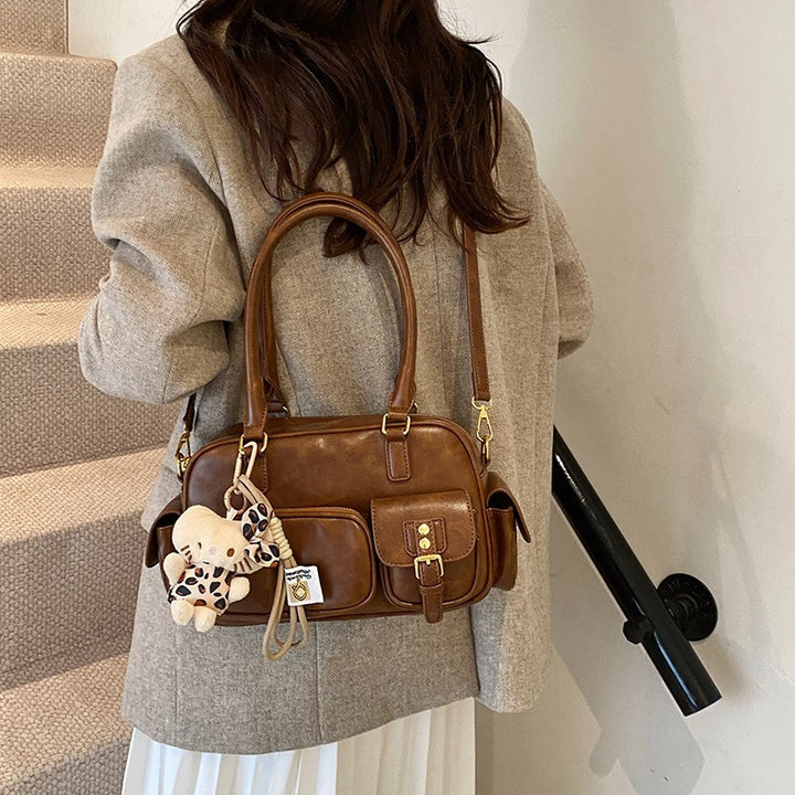 Elegant Handbag with Playful Charms and Multiple Compartments Bowlift