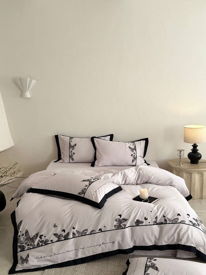 Luxurious cotton satin bedding set with butterfly embroidery and contrasting piping Bowlift