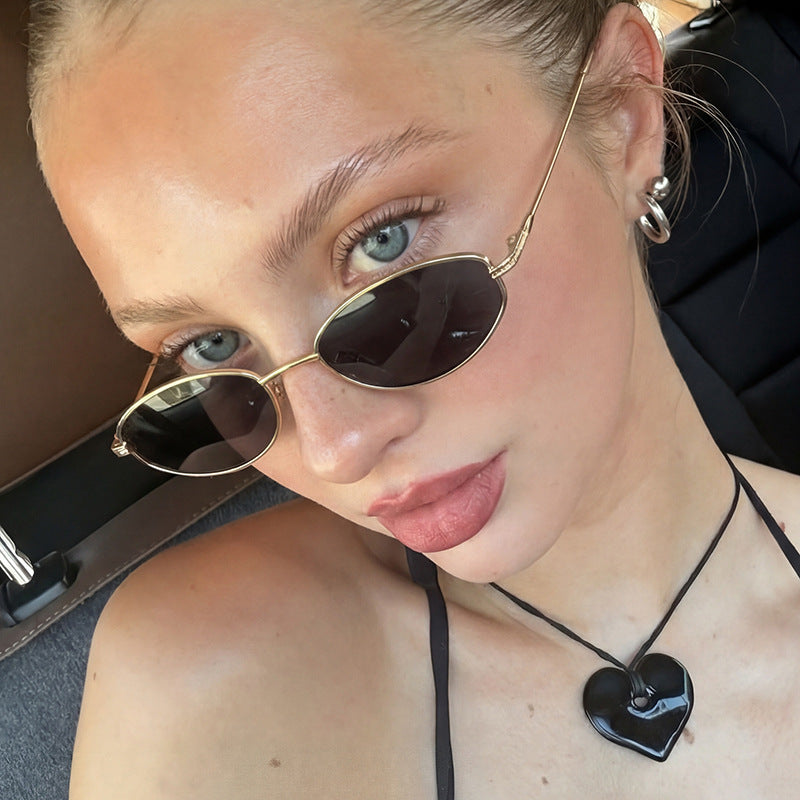 Ladies' fashionable sunglasses in minimalist oval design Bowlift