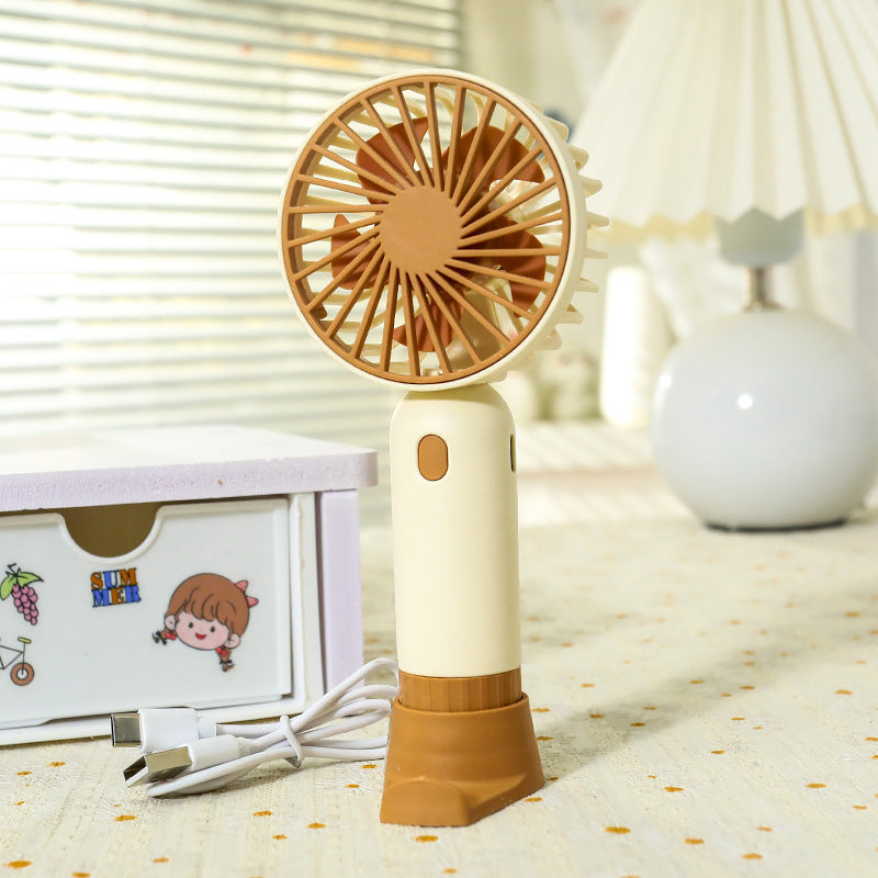 Portable hand fan with ergonomic grip and USB charging function Bowlift