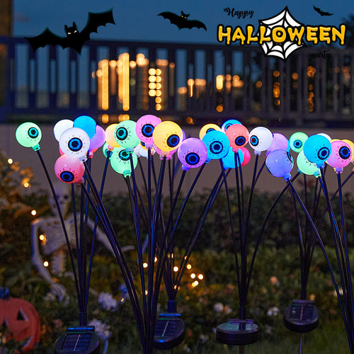 Creepy garden lights with eye motif Bowlift