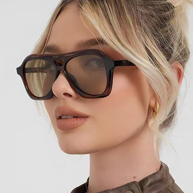 Ladies fashionable sunglasses in innovative design with wide frame Bowlift