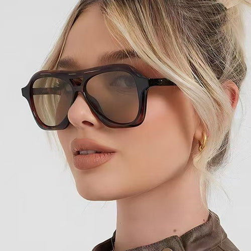 Ladies fashionable sunglasses in innovative design with wide frame Bowlift