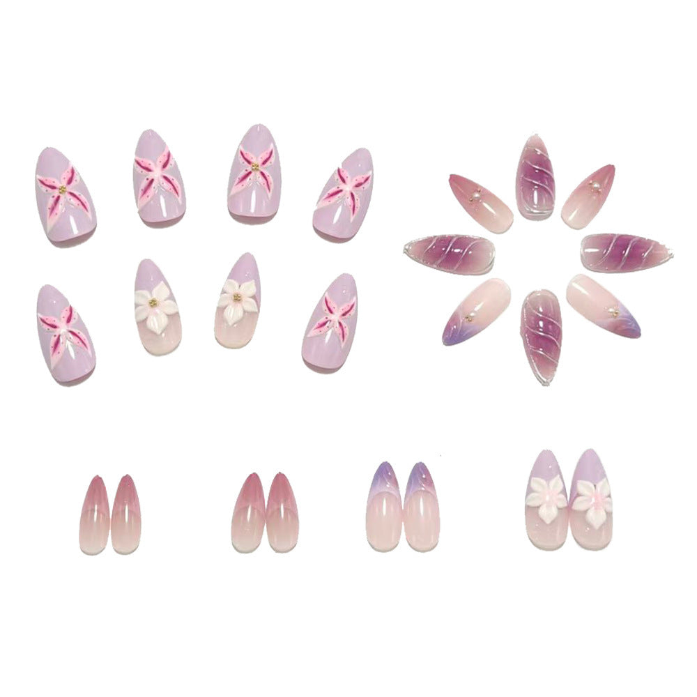 Artificial nails in elegant stiletto design with floral accent Bowlift