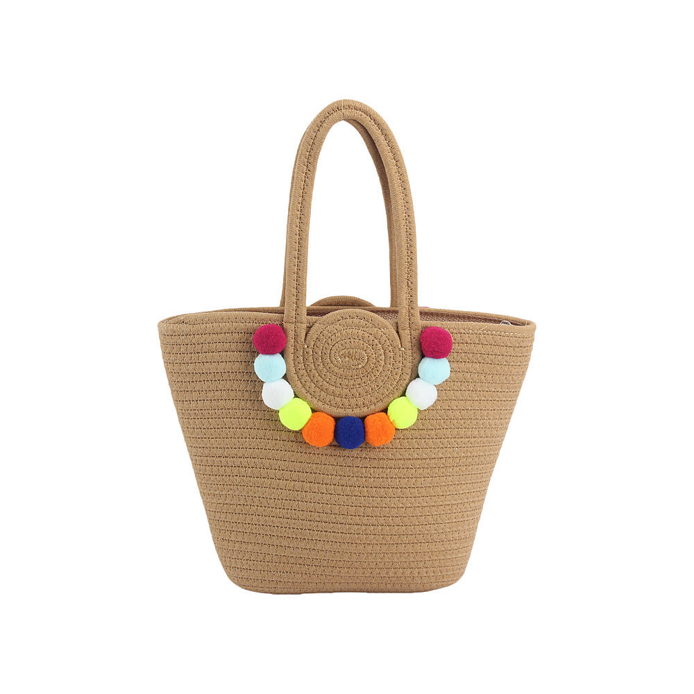 Beach bag with cheerful pom poms Bowlift