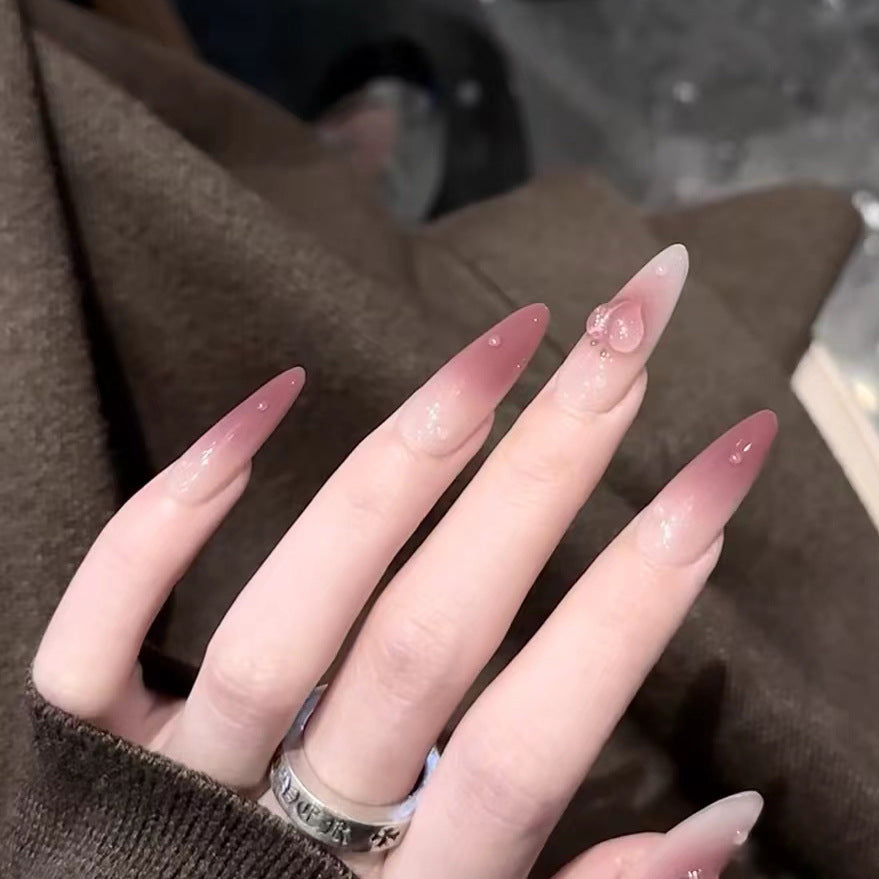 Elegant Press-On Almond Nail Set with Heart Detail Bowlift